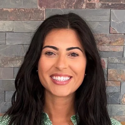A headshot photo of Dr. Gina Caira