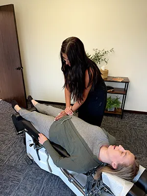 Chiropractor Kenosha WI Gina Caira Adjusting Webster Technique